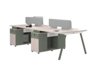 Green and white four-person office workstation with desk screens and storage pedestals