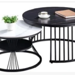 C15# round nesting coffee tables, black and white tops, black frames and open circular metal bases, Qatar