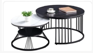 C15# round nesting coffee tables, black and white tops, black frames and open circular metal bases, Qatar